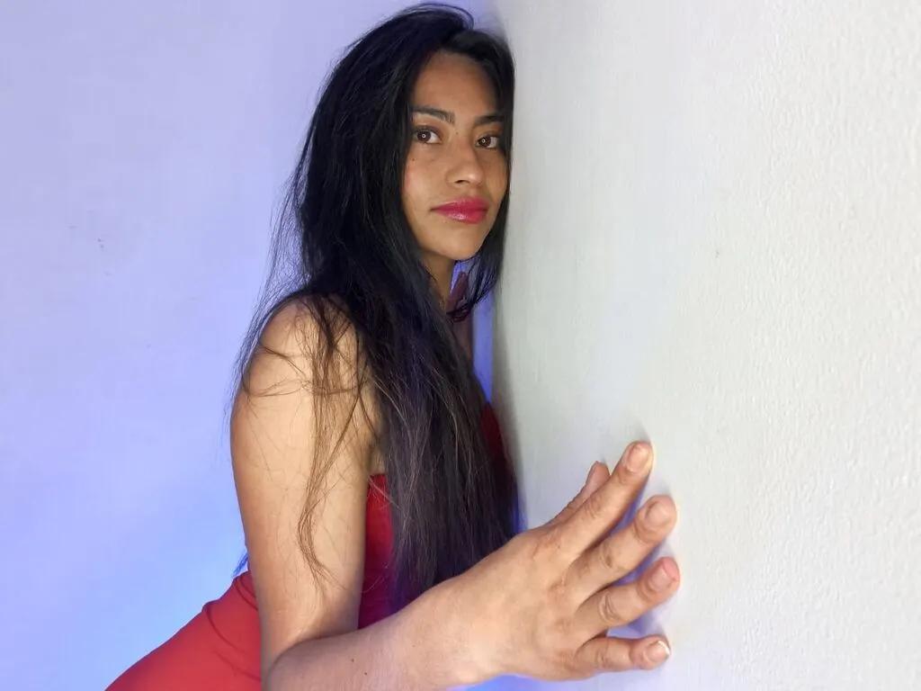 EmilyMitche — I enjoy music, dancing, playful conversations, and teasing just enough to keep you coming back for more. Being young means I love fun, challenges, and exploring every fantasy you want to share with me.